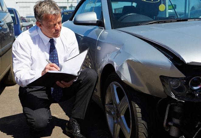 a car being inspected for insurance purposes